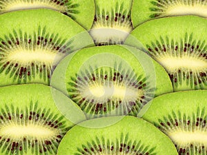 Abstract green background with raw kiwi slices