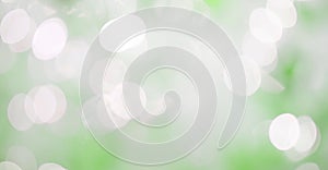 Abstract green bokeh on nature defocus blur background.
