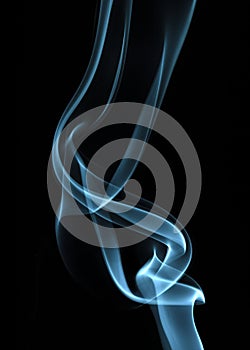 Abstract of green colored smoke with black coloured background