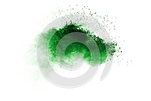 Abstract green dust explosion on white background. Abstract green powder splattered on background