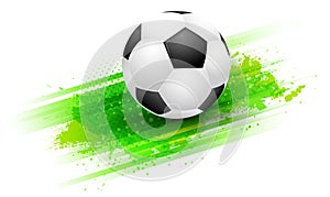 Abstract green grungy background and football soccer ball