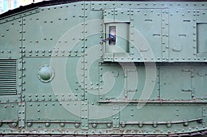 Abstract green industrial metal textured background with rivets and bolts