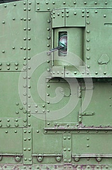 Abstract green industrial metal textured background with rivets and bolts