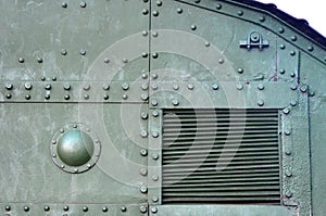 Abstract green industrial metal textured background with rivets and bolts