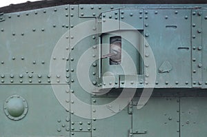 Abstract green industrial metal textured background with rivets and bolts