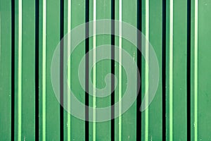 Abstract green metal door texture background close up.