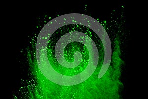 abstract green powder splatted background,Freeze motion of color powder exploding/throwing color powder,color glitter texture on b photo