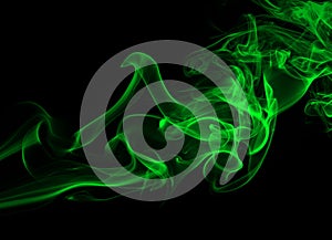 Abstract green smoke on black background, darkness concept