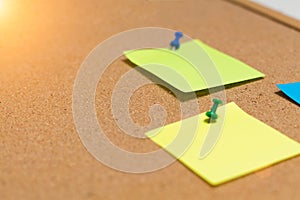 abstract green and yellow paper note pin on cork board. Blank notes for add text message or design website. sticker note, toned, d