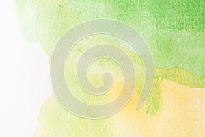 Abstract green, yellow and white watercolor background. art hand paint