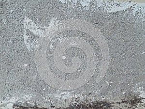 Abstract grey background made of cement and white random patterns
