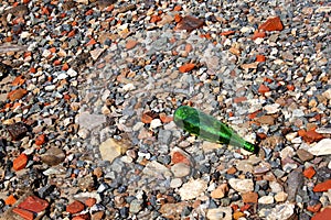 Abstract Grey Red Stones And Green Bottle