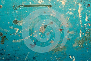 Abstract grunge blue background with paint spots and scratches