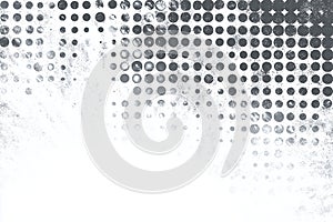 Abstract grunge halftone pattern with grey dots fading into a white textured background