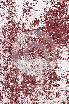 Abstract grunge texture of old red and white wall with peeled off paint. Creative background