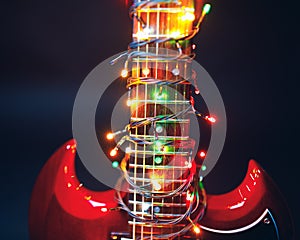Abstract guitar with festive Christmas lights