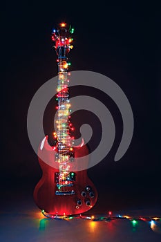 Abstract guitar with festive Christmas lights