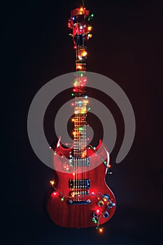 Abstract guitar with festive Christmas lights