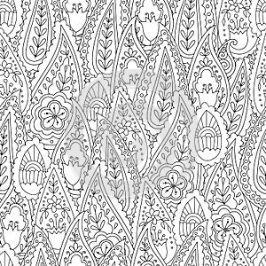 Abstract hand drawn outline doodle ornament seamless pattern with flowers and paisley . Coloring book for adult and