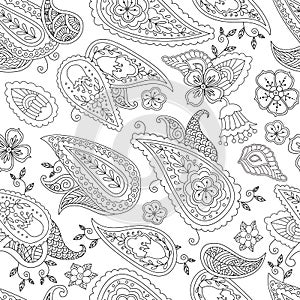 Abstract hand drawn outline doodle ornament seamless pattern with flowers and paisley . Coloring book for adult and