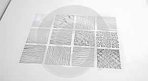 Abstract Hand-Drawn Patterns on White Paper