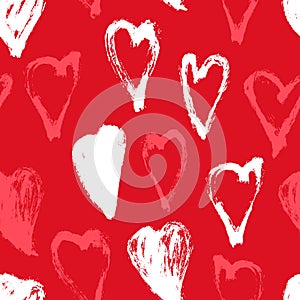 Abstract hand drawn seamless pattern of brush in the shape of heart, drops and strokes of paint, splash. Valentine`s Day.