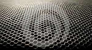 Abstract Hexagonal Mesh Texture with Dramatic Lighting and Shallow Depth of Field