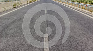 Abstract highway asphalt old gray concrete car road background material texture perspective foreshortening wallpaper pattern