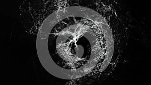 Abstract illustrative stormy white water maelstrom on black background, monochrome seamless loop. Beautiful, spinning