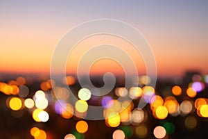 abstract image of blurred night city background with circle lights.