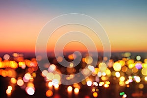 abstract image of blurred night city background with circle lights.