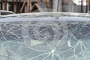 Abstract image of broken glass texture, background. Close-up of a broken car windshield. Broken and damaged car.