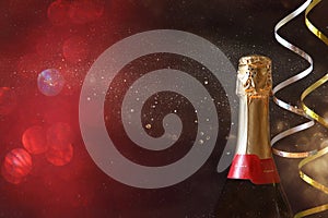 Abstract image of champagne bottle and festive lights