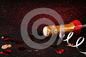 Abstract image of champagne bottle and festive lights