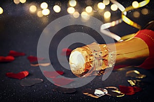 Abstract image of champagne bottle and festive lights