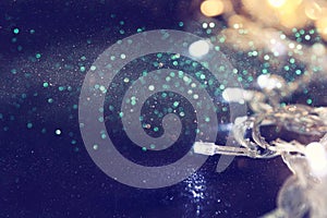 Abstract image of Christmas garland lights on glitter background