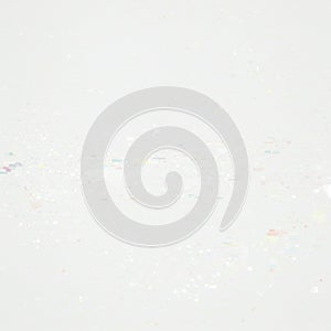 Abstract image featuring a light gray background with a subtle array of small,