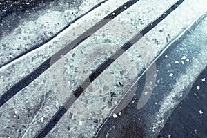 Abstract Image Of The Frozen Surface Of Ice With Parallel Lines Of Different Textures, Reflecting The Winter And Cold