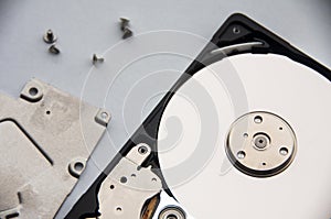 The abstract image of inside of hard disk drive on white cover background. Concept of data, hardware, and information