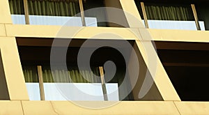 Abstract image of looking up at modern glass and concrete building. Architectural exterior detail of office building