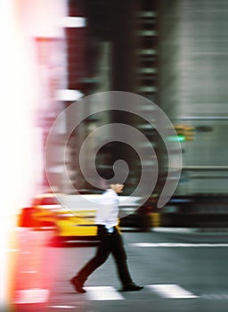 Abstract image of man on zebra crossing