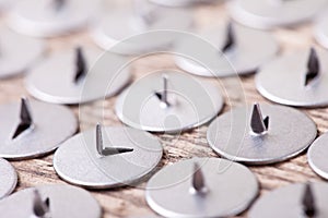 Abstract image of metal sharp pushpin, selective focus