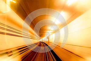 Abstract image of motion blurred tracks and subway tunnel in Copenhagen, Denmark