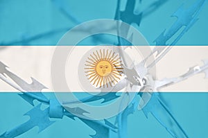 Abstract image of the national flag of Argentina with twisted barbed wire