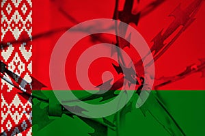 Abstract image of the national flag of Belarus with twisted barbed wire