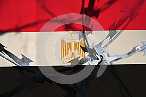 Abstract image of the national flag of Egypt with twisted barbed wire