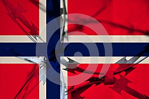 Abstract image of the national flag of Norway with twisted barbed wire.