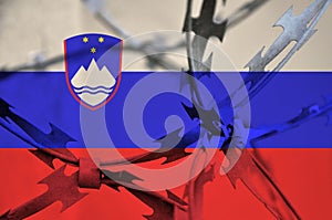 Abstract image of the national flag of Slovenia with twisted barbed wire