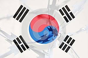 Abstract image of the national flag of South Korea with twisted barbed wire