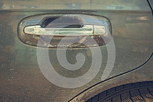 Abstract image of old car door handle.